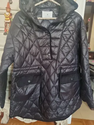 Plumas tipo canguro acolchado