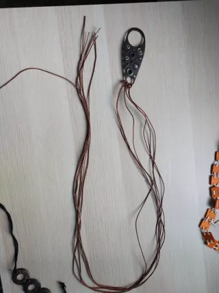 Cinturones fantasía marrón y naranja