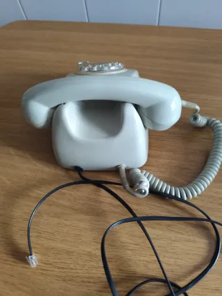 Teléfono antiguo de rueda Gris