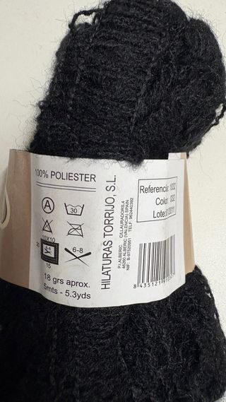 Lote 54 ovillos lana fantasía negra.Nuevo