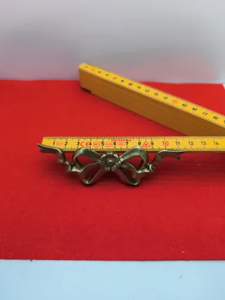 Tirador antiguo lazo flor