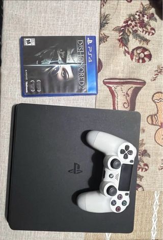 PS4 Negra + Mando y Juego