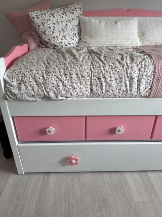 Cama nido grande rosa y blanca sin usar