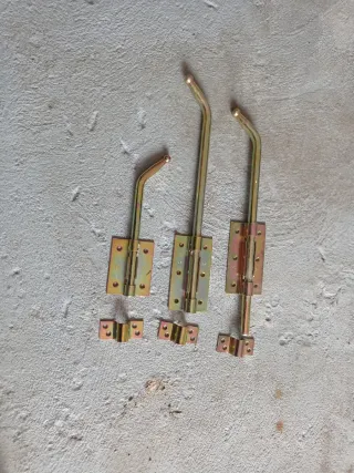 Fallebas metálicas doradas Dos de 32 cm Una de 20