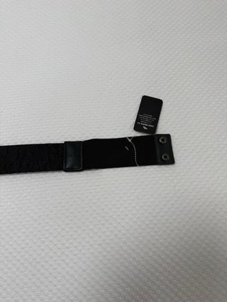 Cinturón elástico negro con nudo