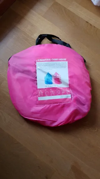 Casa de juegos infantil rosa