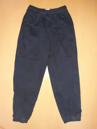 Pantalón negro cintura y tobillos elásticos