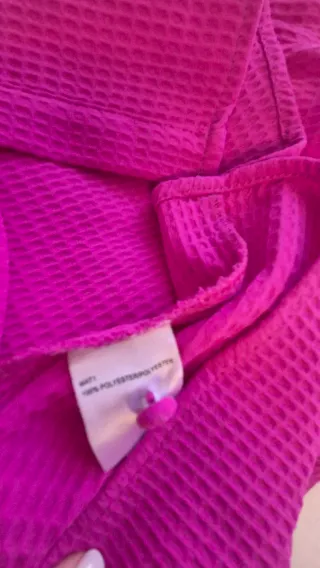 Blusa fucsia con volantes