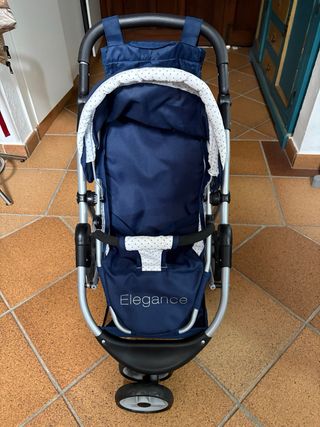 Coche de muñecas azul casi nuevo y se pliega