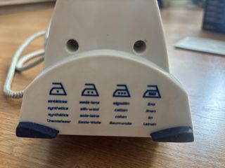 Plancha Taurus con caja e instrucciones