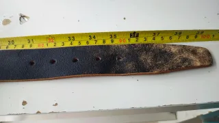 Cinturón de piel negro y naranja