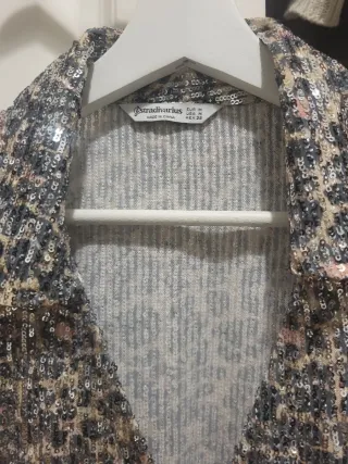 Blusa lentejuelas con base de leopardo