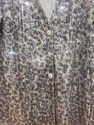 Blusa lentejuelas con base de leopardo