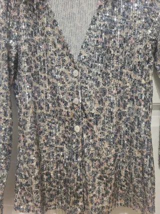 Blusa lentejuelas con base de leopardo