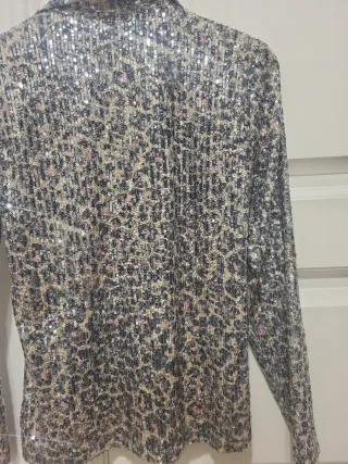 Blusa lentejuelas con base de leopardo