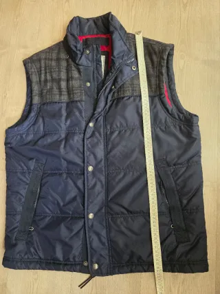 Chaleco acolchado azul y gris