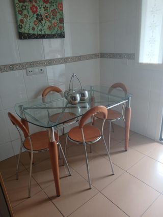 Mesa cristal acero madera y 4 sillas