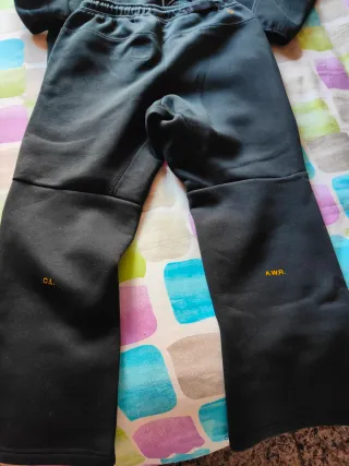 Chándal Nike NOCTA Negro y Dorado