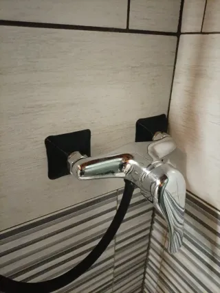 Coppia di borchie design miscelatore