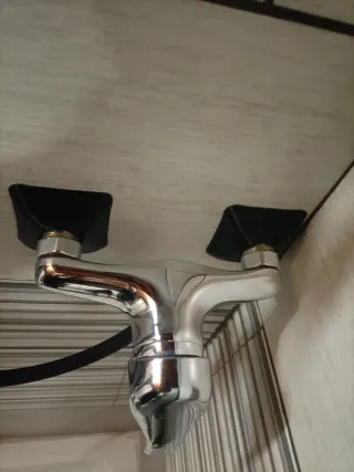 Coppia di borchie design miscelatore