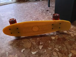 Monopatín infantil amarillo ( precio negociable )