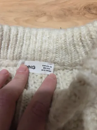 Jersey gris con flecos