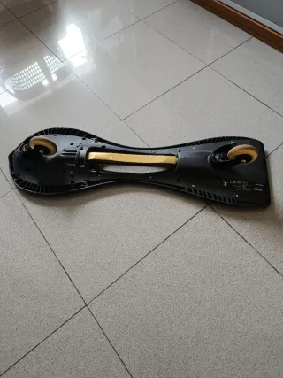 Wakeboard Oxelo Negro y Dorado. Muy buen estado