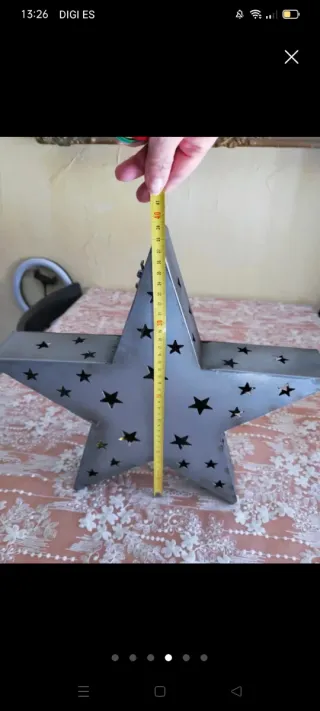 Estrella metal plateada