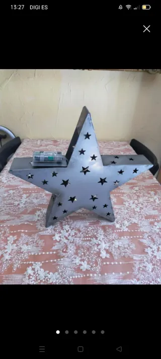 Estrella metal plateada