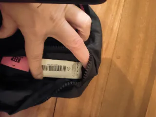 Riñonera ligera deportiva negra y rosa