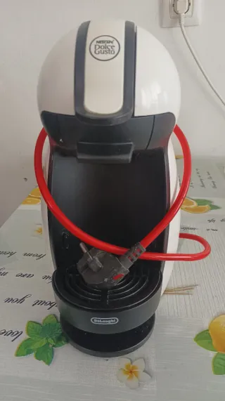 Cafetera Dolce Gusto Blanca y Negra