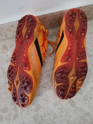 Botas de fútbol 11 tacos turf naranja