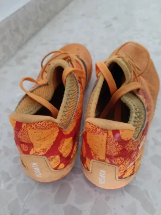 Botas de fútbol 11 tacos turf naranja