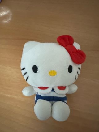 Lote Hello Kitty: Peluche y Cartera Morada
