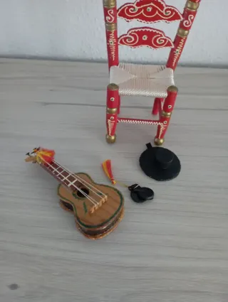 Silla decorativa flamenca con guitarra