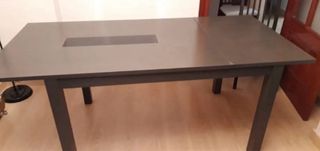 Mesa extensible de madera y cristal