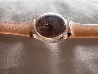 Reloj Swatch original transparente con fecha