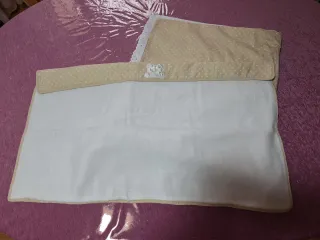 Colcha y cambiador de viaje