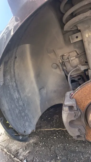 Paso de rueda izquierdo Megane II