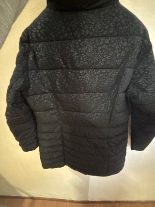 Giubbotto nero con fantasia