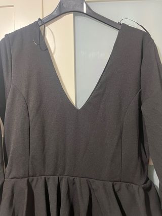 Traje de flamenca negro con volantes