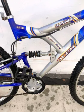 Bicicleta doble suspensión azul