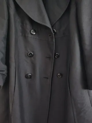 Abrigo negro talla única con bolsillos