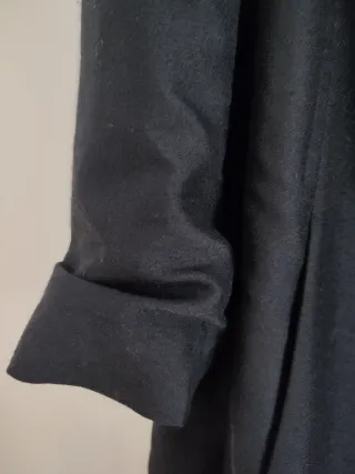 Abrigo negro talla única con bolsillos