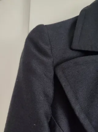 Abrigo negro talla única con bolsillos