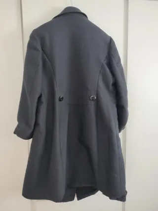 Abrigo negro talla única con bolsillos