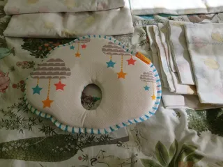 Ropa de cama para bebé: sábanas y cojín