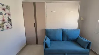 Cama abatible, sofá y armario. GlicerioChaves