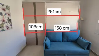 Cama abatible, sofá y armario. GlicerioChaves