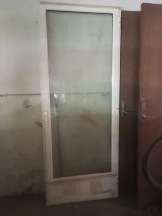 Puerta de galería con cristal